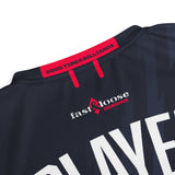 Close-up of Good Times Billiards back neck tape and Fast & Loose Designs logo on blue jersey