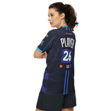 Woman in purple Good Times Billiards jersey, three-quarter back view with custom name and number