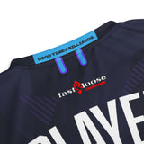 Close-up of Good Times Billiards back neck tape and Fast & Loose Designs logo on purple jersey