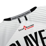 Close-up of Good Times Billiards back neck tape and Fast & Loose Designs logo on white jersey